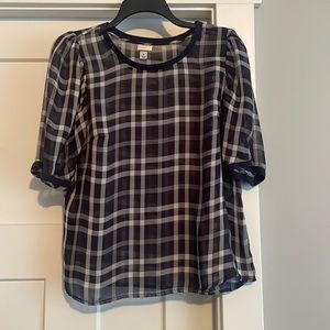 A new day. Size M top.  Blue and white plaid